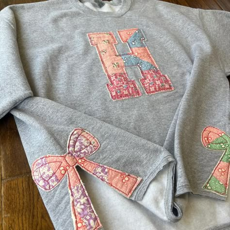 tatumthill's Kate’s Giftguide Gift Guide on LTK Patchwork Clothes Diy, Sweatshirt Patchwork, Diy Hoodies, Sweatshirt Quilt, Flannel Shirt Refashion, Applique Clothes, Bow Sweatshirt, Patchwork Tee, Machine Embroidery Designs Projects