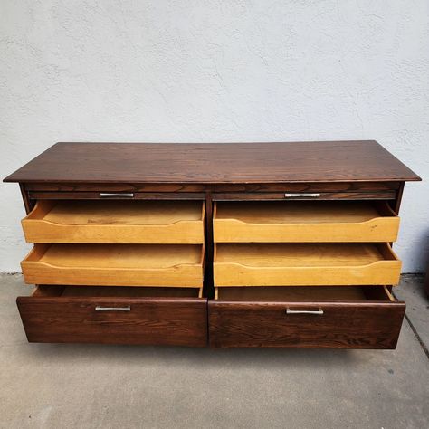 Newest arrival. Heywood Wakefield credenza ✨️ This handsome, mid-century modern buffet / credenza /dresser was made by Heywood Wakefield for their Prophecy Group collection. It is made of solid oak that is finished to a warm, medium walnut tone. It stands on tall, sculpted legs and has elegant silver pulls. Two tambour doors hide 4 half depth drawers. DM for details ✨️ ___ Model is our very own @trevors_modern_life 📸 @kimberli_cakes #vintageshop #vintageaesthetic ##vintagedesignstudio #... Heywood Wakefield Dresser, Credenza Dresser, Mid Century Modern Buffet, Buffet Credenza, Tambour Doors, Heywood Wakefield, Modern Buffet, Vintage Dressers, Wakefield