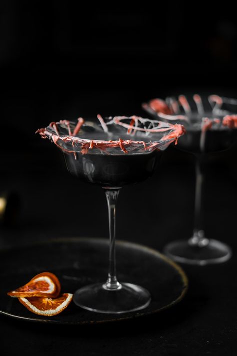 Make this spooky Halloween cocktail inspired by Natasha Romanoff, A.K.A Black Widow! It's a delicious creamy RumChata White Russian with coffee liqueur and marshmallow cob webs that's the ultimate nod to the Avenger.rn Halloween White Russian, Black Widow Cocktail Recipe, Russian Witch Drink, Rumchata White Russian, Black Widow Cocktail, White Russian Cocktail, Halloween Cocktail, Orange Food Coloring, Coffee Liqueur