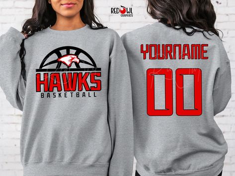 Personalized Hawks School Spirit T-Shirt Crewneck, Hoodie Hooded Sweatshirt Football, Baseball, Basketball, Softball, Track, Volleyball, Cross Country, Cheer, Wrestling Not all colors are available in all sizes and styles.  Please check the color and size charts in photos. We do our best to accurately represent shirt colors by using actual photos but do understand that all monitors will display differently. Please contact us prior to purchase with any questions on sizing or colors. Your purchase includes a custom imprint created specifically for your team! A product proof will be emailed to you within 1 business day.  Please keep an eye on your Etsy messages and reply with any changes within 24 hours. Your order will be sent to production after that time if no response is received. Excessi Eagles Basketball Shirt, Hornets Basketball, Represent Shirt, Basketball Sweatshirts, Cricket Ideas, Cheer Shirts, Basketball T Shirt, Basketball Shirts, Star Shirt