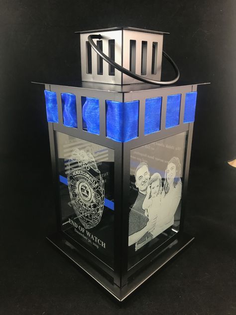 Police Officer Memorial Gift - First Responder Memorial Gift - Memorial Gift
Our lanterns are customized to honor & remember your fallen hero; those that made the ultimate sacrifice. We design our lanterns to bring comfort to family, friends & brothers & sisters in blue. Each side is customized, whether it be their DSN/badge number inside the American flag, a photo, quote or end of watch date. 
www.facebook.com/twosassydesigns Police Chief Retirement Gifts, Police Christmas Ornaments, Police Girlfriend, Police Christmas, Fallen Police Officer, Police Memorial, End Of Watch, Big Sister Quotes