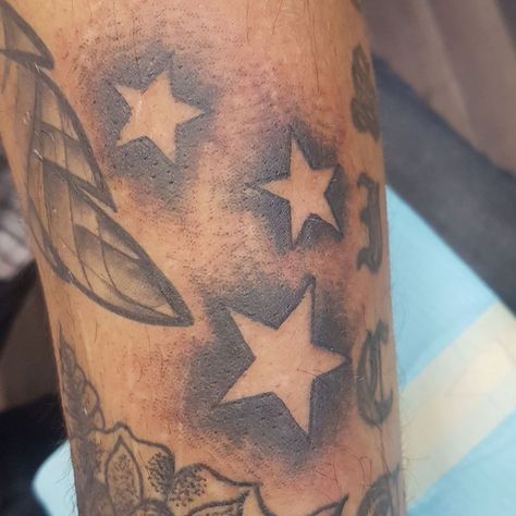 filler neg space stars Neck Filler Tattoo, Flames Tattoo Stencil, Small Filler Tattoo Ideas Men, Tattoo Filler Ideas Men, Star Cover Up Tattoos, Sleeve Filler Ideas Men, Space Filler Tattoo Ideas, Stars Tattoo For Men, Filler Tattoo Ideas Gap Men