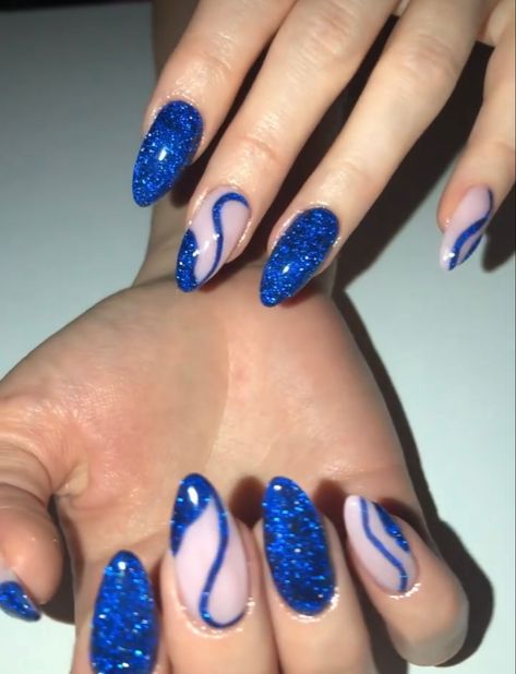 Blue Almond Nails Design Christmas, Blue Sparkle Nails Almond, Dark Blue Glitter Nails Almond, January Nails Almond Blue, Prom Nails Royal Blue Dress, Royal Blue New Years Nails, Blue Disco Nails, Royal Blue Nails Sparkle, Simple Gel Polish Designs