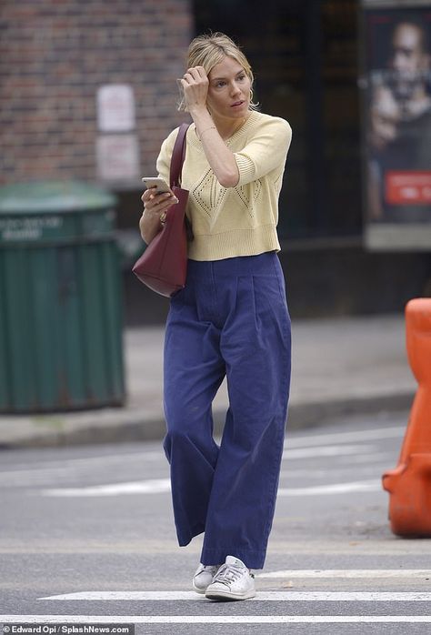 Sienna Miller nails casual chic in pastel yellow sweater and navy flares in New York City | Daily Mail Online Yellow Navy Outfit, Pastel Yellow Outfit, Pastel Yellow Sweater, Yellow Sweater Outfit, Sienna Miller Style, Casually Chic, French Girl Style, Sienna Miller, Formal Casual