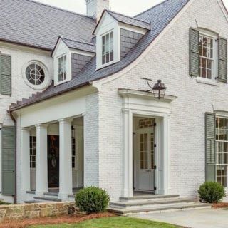 20 Favorite Exterior Paint Colors + Doors and Trim | Laurel Home Brick Whitewash, Whitewash Brick House, White Brick House, Lime Wash Brick, Boxwood Landscaping, Painted Brick Exteriors, Green Shutters, Painted Brick House, Holly House