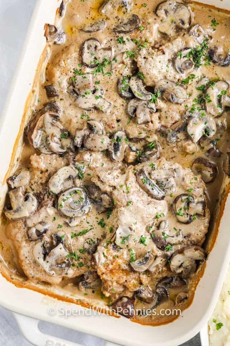 These Mushroom Pork Chops are smothered in a creamy sauce and baked until fork-tender. Serve over egg noodles or mashed potatoes for the perfect meal!  #spendwithpennies #creamofmushroomporkchops #recipe #maindish #easy #creamy Pork Chops Oven Baked, Pan Seared Pork Chops, Baked Pork Chops Oven, Mushroom Pork Chops, Breaded Pork Chops, Comfort Food Chicken, Baked Mushrooms, Pork Chop Recipes Baked, Pork Chop Dinner