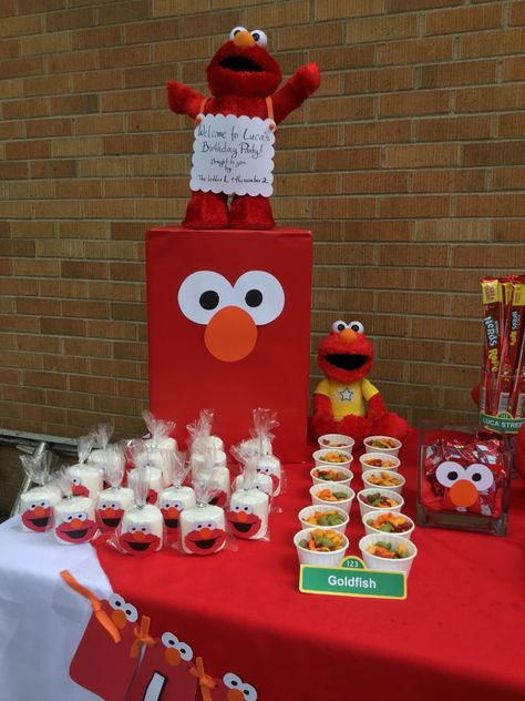 Elmo Sweet Table Ideas, Elmo Table Decorations, Elmo Centerpiece Ideas 1st Birthday, Elmo’s World Birthday Party, Elmo Centerpiece Ideas, Elmo Centerpieces, Elmo Party Favors, Sesame Street Birthday Party Ideas Boy, Elmo Birthday Party Boy