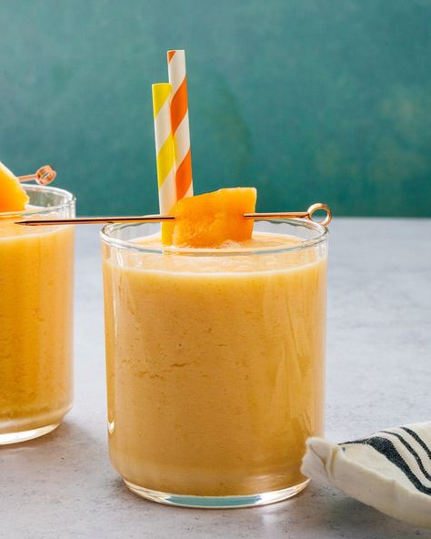 This refreshing cantaloupe smoothie recipe is lightly sweet and delicately fruity! All you need are 4 ingredients plus ice. #canataloupe #smoothie #cantaloupesmoothie Cantaloupe Smoothie, Canteloupe, Snack Items, Banana Smoothie, Smoothie Recipe, Healthy Ingredient, Living Food, 4 Ingredients, Simple Ingredient