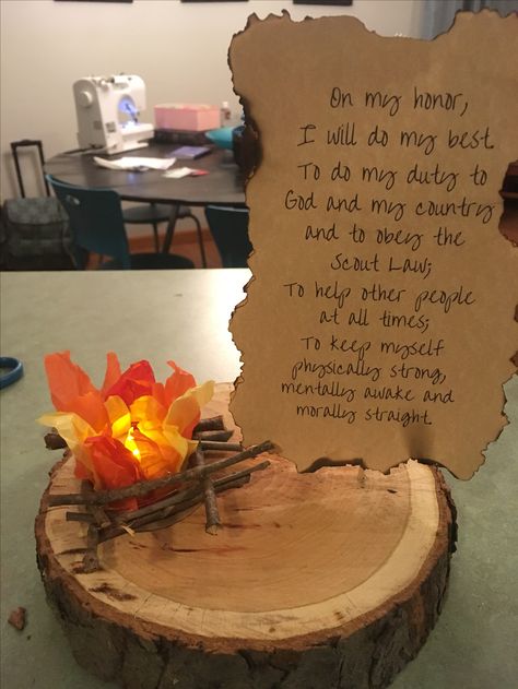 Eagle Scout centerpiece Cricut Eagle Scout, Eagle Award Ceremony, Eagle Scout Desserts, Eagle Scout Celebration Ideas, Fire Centerpiece Ideas, Cub Scout Recruitment Table, Eagle Scout Party Ideas, Eagle Ceremony Ideas, Eagle Scout Ceremony Ideas