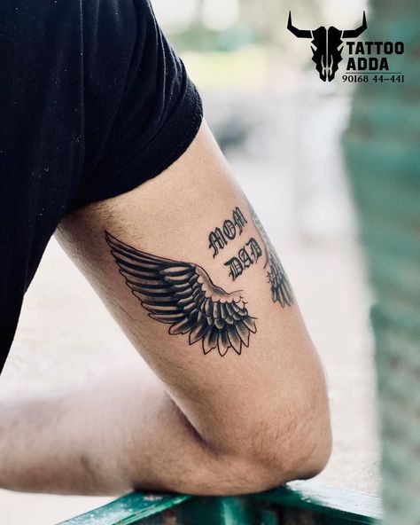 Thought Tattoo For Men, Wings With Name Tattoo, Wings Tattoo Men, Mom And Dad Tattoo, Typographic Tattoo, Mom Dad Tattoo, Tattoos On Arm, Mom Dad Tattoo Designs, Wing Tattoo Men