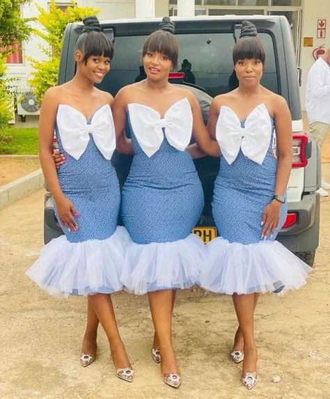 Short African Bridesmaid Dresses. - Gist94 Sesotho Traditional Dresses, Shweshwe Wedding Dresses, Bridesmaid Dresses 2023, African Bridesmaids, South African Traditional Dresses, Latest Bridesmaid Dresses, Bridesmaids Jumpsuits, African Bridesmaid Dresses, African Traditional Wedding Dress