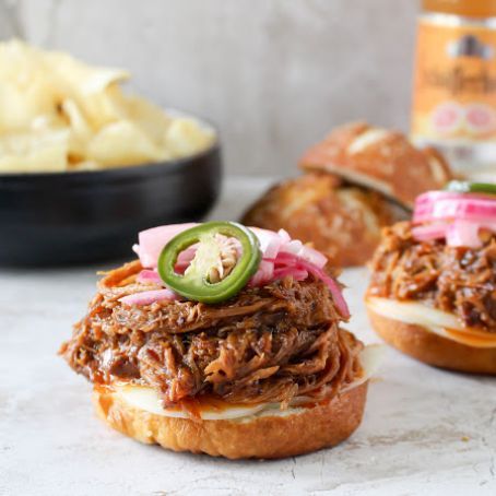 Bourbon Pulled Pork, Pork Sliders Recipes, Slider Recipe, Pulled Pork Sandwiches, Pretzel Rolls, Pulled Pork Sliders, Pulled Pork Leftovers, Sweet Pork, Pork Sandwiches