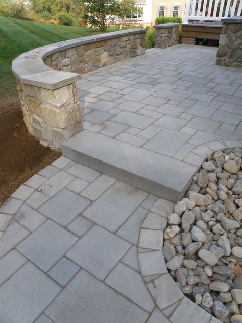 Bluestone Patio With Retaining Wall, Stone Wall Patio, Stamped Concrete Patio Bluestone, Paver Patio With Retaining Wall, Patio Inspiration Backyard, Patio With Stone Wall, Outdoor Patio Stone, Paver Stone Patio, Decorative Concrete Patio