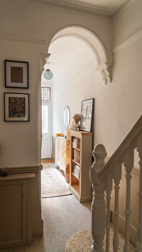 Hallway transformation finally has arrived!! ✨ Genuinely super happy with how this turned out, despite all of the various issues I had with horrendously tall Victorian skirting, having to account for dado rails then deciding to up-cycle a bookcase bespoke to the space creating three pieces of original art - after all that unexpected faff I finally have a nice hallway woo! We don’t look at the upstairs because that’s not quite done but hey a win is a win!! #homereno #housetransformation #home Old Farmhouse Upstairs Hallway, Victorian Farmhouse Staircase, Victorian Skirting, A Win Is A Win, Hallway Transformation, Folk Victorian Farmhouse, Dado Rail, Super Happy, Home Reno