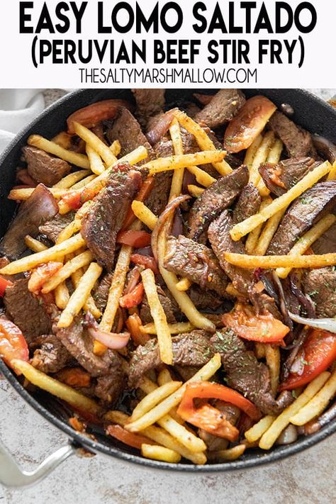 Lomo Saltado is an easy to make Peruvian beef stir fry recipe!  Made with beef tenderloin, onions, tomatoes, french fries and an amazing savory and tangy sauce! Easy Lomo Saltado Recipe, Lomo Saltado Recipe, Peruvian Beef, Beef Stir Fry Recipe, The Salty Marshmallow, Ramadan Recipe, Salty Marshmallow, Beef Stir Fry Recipes, Peruvian Dishes