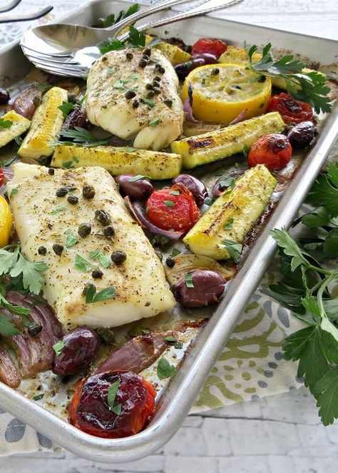 Mediterranean Cod Sheet Pan Dinner. Thinly slicing the garlic and quartering the zucchini ensures that they cook through in the same time as the fish. Mediterranean Cod, Mains Recipes, Sheet Pan Suppers, Sheet Pan Dinners Recipes, Easy Mediterranean Diet Recipes, Mediterranean Diet Plan, Cod Recipes, Fish Dinner, Pan Meals