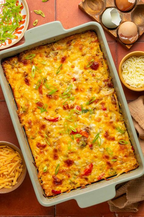 The Tex Mex Hash Brown Egg Casserole blends breakfast sausage, eggs, veggies, hash browns, cheese, and taco seasoning for a flavorful twist on a classic breakfast dish. Perfect for a holiday breakfast, weekend brunch, or an easy make-ahead meal, this hearty casserole is sure to please a crowd. Tex Mex Breakfast, Hash Brown Egg Casserole, Breakfast Egg Casserole Recipes, Easy Protein Pancakes, Tater Tot Breakfast Casserole, Brown Egg, Breakfast Egg Casserole, Tater Tot Breakfast, Hearty Casseroles