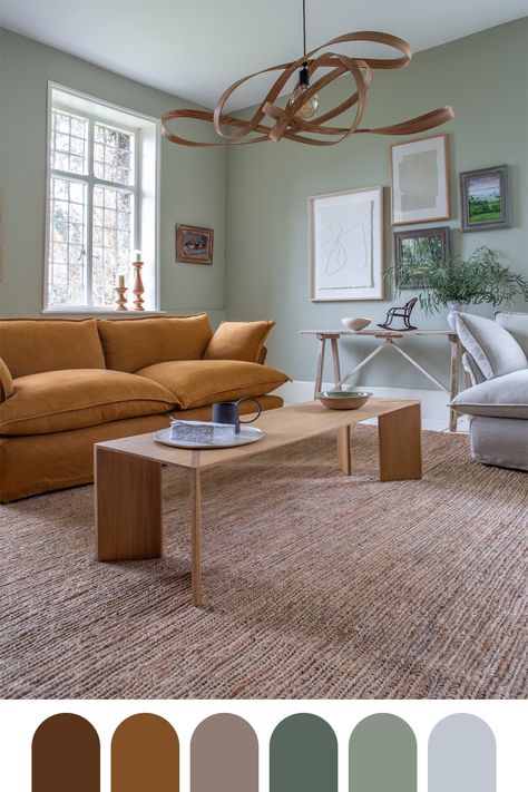 Room Colour With Brown Furniture, Earth Tone Sitting Room, Oak Color Furniture, Jute Sofa Living Room, Sage Green Living Room Tan Sofa, Brown Furniture Living Room Paint, Green Living Room Dark Floor, Cold Tone Living Rooms, Beige And Green Aesthetic Living Room