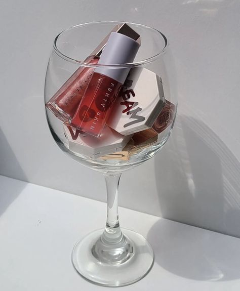 A wine glass filled with mini lipsticks from fenty. Make Up Product Photography Ideas, Content Creator Photo Ideas, Ugc Content Lipstick, Influencer Product Photography, Ugc Lip Gloss, Makeup Products Photoshoot Ideas, Ugc Content Makeup, Makeup Product Photography Ideas, Ugc Content Ideas Skincare