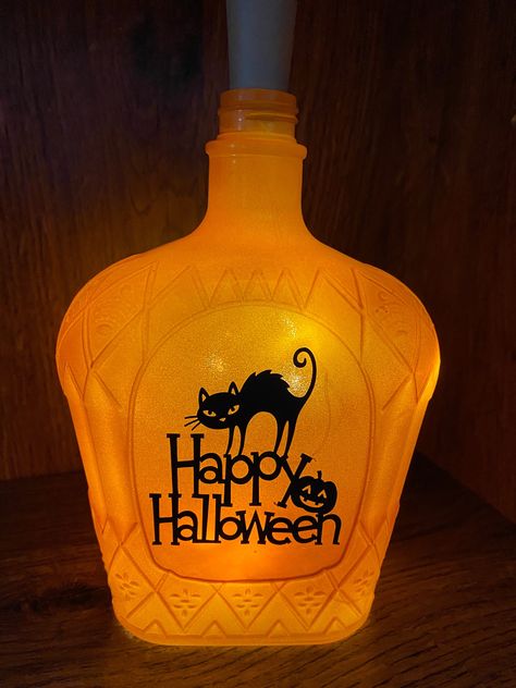 Liquor Bottles Crafts, Halloween Bottles And Jars, Repurposed Liquor Bottles, Halloween Bottle Crafts, Crown Royal Bottle Crafts Diy Halloween, Halloween Decorations Bottles, Repurpose Liquor Bottles, Halloween Liquor Bottles, Halloween Bottle Art