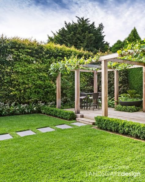 Justine Carlile on Instagram: "Enveloped by lush greenery, this heavenly backyard is the perfect place to relax and unwind with family and friends. Landscape Design: @justinecarlilelandscapedesign Timber: @porta_timber Feature Pot: @martinkellockpotsnplanters Photography: @patrickredmondphotography1" Bbq Arbor Ideas, Garden Arch Ideas, Arbour Garden, Carport Landscaping Ideas, Pergola Landscaping Ideas, Landscape Pergola, Garden Arches Ideas Backyards, Timber Pergola, Garden Arches