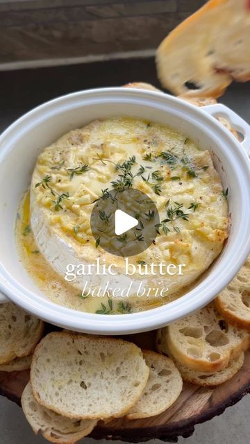 Nicolle | Cheese, Wine, Appetizers & Dinner Parties on Instagram: "a baked brie CLASSIC 🧀

If your new to baked brie or not sure what toppings to put on yours that all your guests will like, then THIS is the recipe for you! 

Garlic butter baked Brie 🧈🧀🤤

What you’ll need:

🧀 Brie cheese wheel 
🧀 melted butter (I used @kerrygoldusa)
🧀 garlic (1-2 cloves chopped finely)
🧀 salt & pepper (optional)
🧀 fresh thyme (optional)

Heat oven to 400 and bake for 10-15 minutes or until you gently pat the brie and it feels soft or starts to ooze

SAVE this baked brie recipe and stay tuned for the LAST day of baked BRIE week tomorrow 🧀

•
•
•

#huffposttaste #sharetheeverygirl #foodie #foodstyling #eeeeeats #gofinding #cheeseboard #wineandcheese #feedfeed #todayfood #foodandwine #TOHfoodie #tas Brie Baker Recipes, Recipe With Brie Cheese, Brie Recipes Easy, Brie Cheese Appetizer, Brie Cheese Recipes, Baked Brie Recipe, Wine Appetizers, Baked Brie Recipes, Cheese Wheel