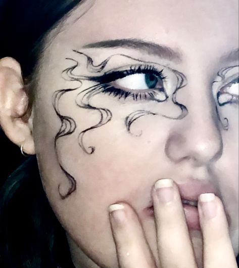 Abstract Eyeliner Looks, Swirly Makeup Look, Squiggly Eyeliner, Squiggle Eyeliner, Feather Eyeliner, Spiral Eyeliner, Interesting Eyeliner, Ghost Eyeliner, Abstract Eye Makeup