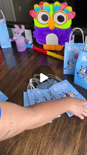 Bluey FanClub 💙💙 on Instagram: "Packing Bluey gift bags for my daughters birthday party! 🎥 Content by: on tiktok @justjocelynnaround#bluey #blueyabc #blueyandbingo #blueyaustralia #blueyofficial #blueyfans #blueytheheeler #blueymoments #blueytoys #blueyparty #blueycake #blueycostume #blueyfanart #blueysisters #blueyfamily #blueyfandom #blueylove #blueyfun #blueymom #blueydad #blueyparents #blueyfriends #blueyseason3 #blueymerchandise #blueysquad #blueyandfriends #blueyandfamily #blueyquotes #blueyparenting #blueymemes" Bluey Loot Bags, Bluey Goodie Bags Favors, Bluey And Bingo Cupcakes, Bluey Favor Bags, Bluey Gift Bags, Bluey Party Bags, Bluey Party Ideas, Bluey Birthday Party Ideas, Diy Party Bags