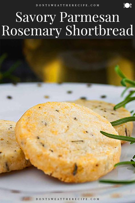 Fresh rosemary, parmesan cheese, and loads of fresh cracked black pepper make this savory Parmesan Rosemary Shortbread the perfect cocktail appetizer or snack. #holidays #recipe #coctails #cookies Rosemary Parmesan Shortbread, Rosemary Cheese Crackers, Rosemary Parmesan Crackers, Parmesan Cheese Appetizers, Parmesan Shortbread Cookies, Parmesan Cookies Recipe, Appetizers With Rosemary, Savory Shortbread Crackers, Savory Cheese Cookies