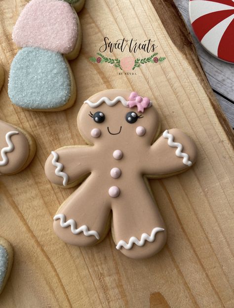 Gingerbread girl cookie Gingerbread Girl Cookies Decorated, Pink Gingerbread Cookies, Girl Gingerbread Cookies, Gingerbread Cookie Icing, Decorated Gingerbread Cookies, Gingerbread Sugar Cookies, Icing For Gingerbread Cookies, Gingerbread Girl Cookie, Gingerbread Boy And Girl