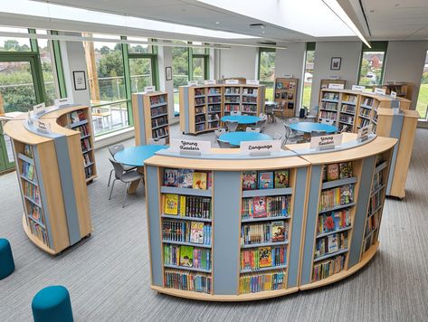 curved shelving in secondary school library Secondary School Library Design, Secondary School Library, School Library Circulation Desk Ideas, School Library Seating, Middle School Library Decorating Ideas, High School Library Design, Library Circulation Desk, Library Furniture School, Library Furniture Design