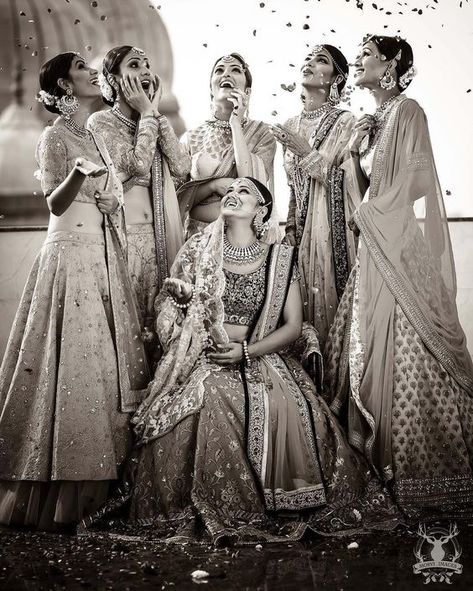 Bride with her Bridesmaids | Fun photos with Indian bridesmaids | Flower shower | Bride tribe | Bff's Wedding | Bride squad | Bridesmaids photoshoot ideas | Indian wedding photography | Black and white portraits | Picture Credits: Morvi Images | Every Indian bride’s Fav. Wedding E-magazine to read. Here for any marriage advice you need | www.wittyvows.com shares things no one tells brides, covers real weddings, ideas, inspirations, design trends and the right vendors, candid photographers etc. शादी की तस्वीरें, Bridesmaid Poses, Wedding Photography Bridal Party, Bridesmaid Pictures, Bridesmaid Photoshoot, Indian Bridesmaids, Photography Indian, Bridal Photography Poses, Bride Photography Poses