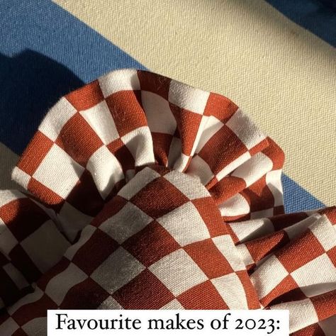 Daniel Matthews on Instagram: "Another one of my favourite makes in 2023- the 5ft ruffle bolster cushion… made from a tablecloth. I previously made a striped one for the master bedroom, and decided months later to create another to give away. I loved this one so much! It had over 10m of ruffle ✨…The lovely Rebecca from @casa_de_haro won it and looks perfect in her home! Would love to make more in 2024, what do you think? Dan x • • • #diy #diydecor #colour #design #checkerboard #tablecloth #bolstercushion #ruffle #rufflecushion #interiordesign #interiorstyling #homereno #renovation #periodproperty #myhomestyle #aesthetic #diycrafts #sewing #getthelook" How To Make A Bolster Cushion Cover, How To Make A Bolster Pillow, Bolster Pattern Pillow Tutorial, Orange Bolster Pillow, Striped Bolster Pillow, Period Property, Bolster Cushions, Home Reno, Get The Look