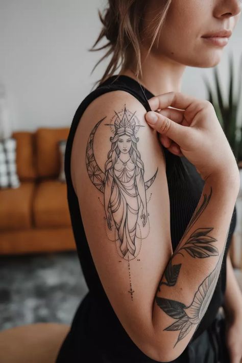 Explore various moon tattoo designs for women showcasing symbolic art, including a goddess figure with a crescent moon. A blend of sky inspiration and feminine beauty captured in one image. Moon Tattoo Ideas, Full Moon Tattoo, Crescent Moon Tattoo, Latest Tattoos, Tattoo Shows, Tattoo Ideas For Women, Tiny Star, Tree Silhouette, Forearm Tattoo