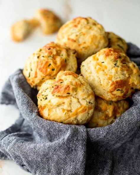 These easy cheddar drop biscuits use a shortcut method to make them light, tender, and crumbly with melted butter and a few pantry staples. All you need is a mixing bowl and a few minutes. Cheddar Drop Biscuits, Side Dishes For Thanksgiving, Dishes For Thanksgiving, Drop Biscuits, Baking Items, Biscuits Easy, Best Side Dishes, Big Meals, Pantry Staples