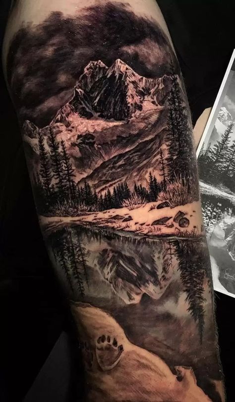 Nature Tattoos: Meanings, Tattoo Designs & Ideas Mountain Sleeve Tattoo, Mountain Tattoo Ideas, Forest Tattoo Sleeve, Natur Tattoo Arm, Outdoor Tattoo, Mountain Tattoos, Animal Sleeve Tattoo, Nature Tattoo Sleeve, Wolf Tattoo Sleeve