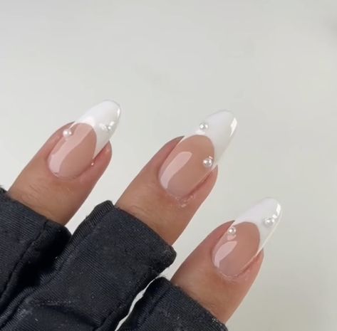 New Years Nails French Tip Almond, French Nails Ideas With Diamonds, Almond French Tip Nails Rhinestones, Almond French Tip Nails By Skin Tone Range, White French Tip Pearls, French Type Nails, V Shape French Tip Nails Almond, Almond French Tip With Pearls, Winter French Tip Nails Almond