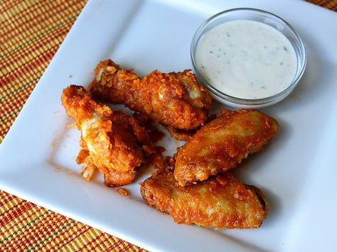 These spicy, Mexican-inspired wings are ready in just 45 minutes, and all you need to make them is four ingredients! Whip these up for Game Day or for a new spin on taco night. Crushed nacho-flavored chips sprinkled on top will add even more flavor and crunch. Pair them with taco-seasoned sour cream for a cool accompaniment! Seasoned Sour Cream, Taco Chicken, Mexican Chicken Recipes, Cheese Straws, Yummy Chicken Recipes, Bowl Recipe, Jambalaya, Chicken Wing Recipes, Wing Recipes