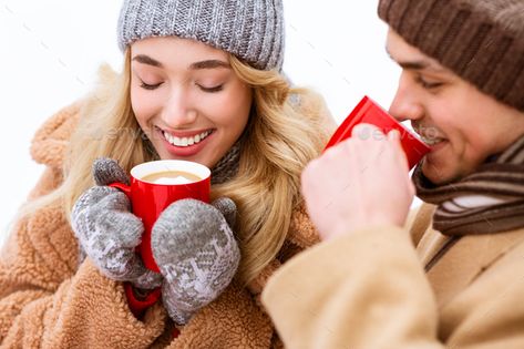 Warming Drink. Romantic Couple Drinking Hot Chocolate Outdoors In Winter Day by Prostock-studio. Warming Drink. Romantic Couple Drinking Hot Chocolate With Marshmallows Outdoors In Winter Day, Holding Red Mugs, Enj... #Sponsored #Hot, #Drinking, #Outdoors, #Chocolate Drinking Hot Cocoa Photoshoot, Drinking Hot Chocolate Pose, Teeth Reference, Hot Chocolate Images, Couple Drinking, Hot Chocolate With Marshmallows, Chocolate With Marshmallows, Drinking Hot Chocolate, Winter Fire