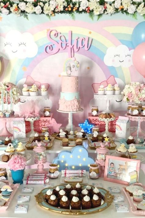 Fall in love with this pretty rainbow-themed birthday party! The dessert table is gorgeous! See more party ideas and share yours at CatchMyParty.com   #catchmyparty #partyideas #rainbow #rainbowparty #girlbirthdayparty Birthday Party Gift Table Ideas, Rainbow Themed Birthday Party, Dessert Table Backdrop, Girls Birthday Party Themes, Pretty Rainbow, Party Backdrops, Rainbow Parties, 1st Birthday Photoshoot, Girl Birthday Themes