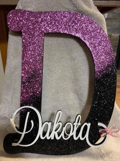 Bought the 12 inch wood letter from hobby lobby. Painted it with a really thick layer of chaulk black paint, while still wet add your glitter of choice in this case i did black and pink glitter, let dry completely, spray with clear laquer, may take a few sprays.name i had made from seller on etsy and painted white. Hot glue it on letter. Glitter i bought from Hobby Lobby Wood Letter Painting Ideas, Rhinestone Crafts, Diy Canvas Wall Art, Diy Resin Projects, Personalized Letters, Painted Letters, Wood Letters, Easy Diy Projects, Wooden Letters