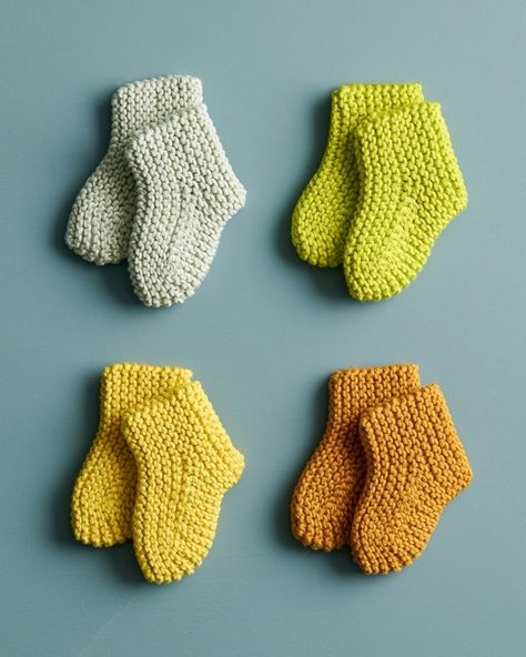 Happy Feet Booties - Purl Soho | Beautiful Yarn For Beautiful KnittingPurl Soho | Beautiful Yarn For Beautiful Knitting Knit Baby Booties Pattern Free, Baby Booties Free Pattern, Baby Bootie, Miniature Knitting, Baby Booties Knitting Pattern, Knitting Dolls Clothes, Creative Knitting, Knit Baby Booties, Handmade Baby Gifts