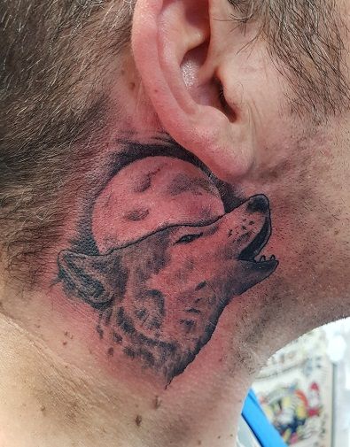 Wolf.  Neck Tattoo Wolf Tattoo On Neck, Wolf Neck Tattoo Men, Wolf Neck Tattoo, Wolf Tattoo, Halloween Tattoos, Neck Tattoo, Black And Grey Tattoos, Behind Ear Tattoo, Tattoos For Guys