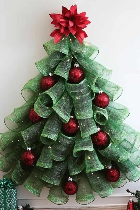 A DIY Deco Mesh Wreath in the shape of a Christmas Tree. Dollar Tree Wire Form Crafts, Diy Mesh Ribbon Wreath, Mesh Christmas Tree Diy Wreath Tutorial, Diy Christmas Tree Wreath, Mesh Crafts Ideas, Christmas Tree Wreath Diy Mesh, Nylon Net Christmas Tree, Dollar Tree Christmas Tree Wreath, Deco Mesh Wreaths Tutorials Step By Step