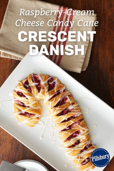 Whether you need to distract the kids from opening presents on Christmas morning or feed your overnight guests around the holidays, this candy cane-shaped Danish filled with fresh raspberries and cream cheese is the way to do it. Candy Cane Shaped Danish, Cream Cheese Candy Cane, Cream Cheese Candy, Crescent Danish, Breakfast Christmas Morning, Christmas Supper, Breakfast Christmas, Raspberry Cream Cheese, Raspberry Jelly