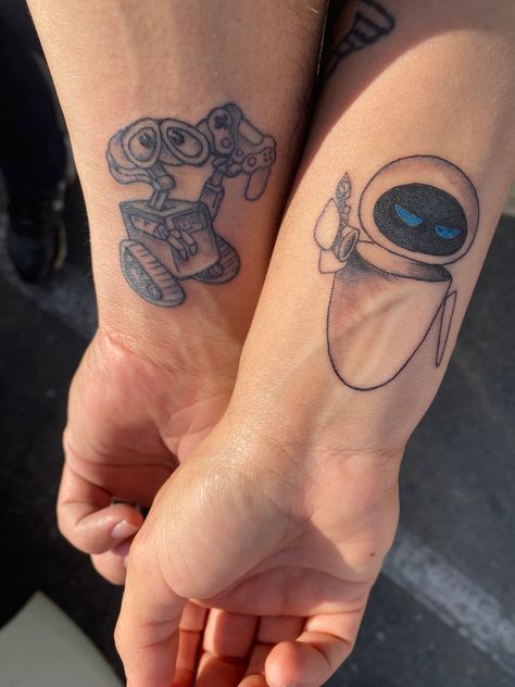 Wall-e and Eve Walle Eve Tattoo, Wall E Matching Pfp, Wall E And Eve Matching Pfp, Walle And Eve Tattoos, Wall E And Eve Tattoo, Wall E Tattoo, Cute Couple Tattoo, Eve Tattoo, Walle Y Eva