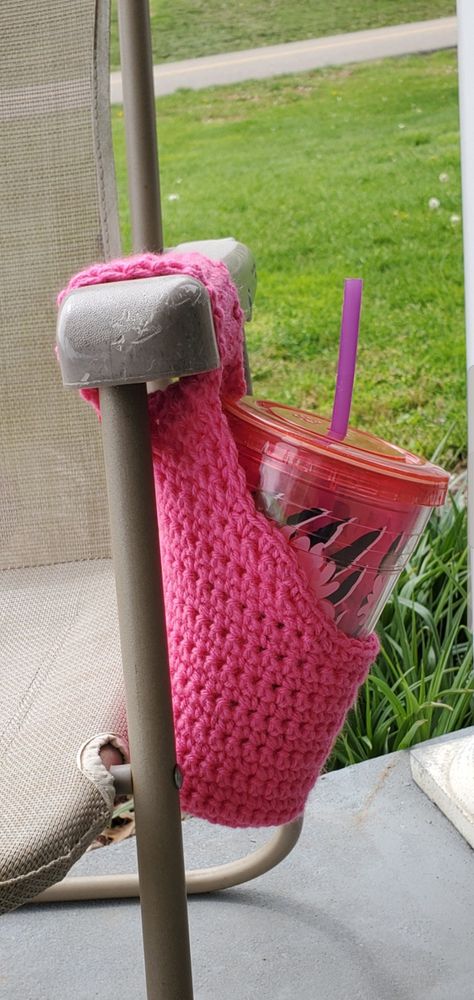 This is my original design for my cupholders. These are great for lawn chairs, wheelchair, strollers, and much more. This cup holder wraps over the chair arm and ties in place holds a variety of size drinks from cans to large fast food cups. Message me for more details if you are Interested. Crochet Camping Gear, Crochet Wheelchair Accessories, Crochet Stanley Cup Holder Free Pattern, Crochet Stanley Cup Holder, Crochet Cup Holder, Food Cups, Knitted Decor, Adaptive Tools, Wheelchair Bags