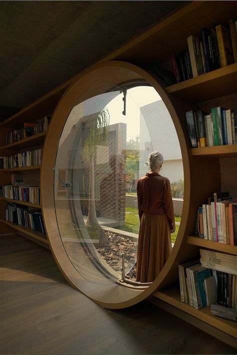 opposite circular openings offer visual connection through 'casa UC' in mexico Round Window, Masonry Wall, Brick Architecture, Concrete House, Pilates Studio, Polished Concrete, Stack Of Books, Interior Walls, Interior Spaces