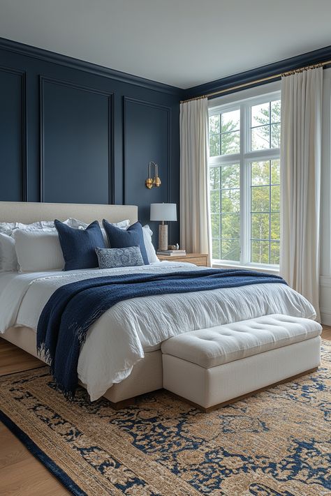 Create a luxurious and inviting atmosphere with navy blue and gold bedroom ideas.  Explore deep navy walls and gold accent furniture for a sophisticated look.  Discover navy velvet headboards, gold-framed mirrors, and brass light fixtures to add elegance and warmth.  Find inspiration for navy and gold throw pillows, gold geometric wall art, and plush navy carpets to design a comfortable and stylish sleeping space. Navy Blue Wall Bedroom Ideas, Guest Bedroom Ideas With Accent Wall, Blue Velvet Headboard Bedroom Ideas, Navy Blue Wall Bedroom, Navy Blue Feature Wall Bedroom, Navy And Light Blue Bedroom, Navy Feature Wall Bedroom, Navy Master Bedrooms Decor, Navy Bedroom Accent Wall