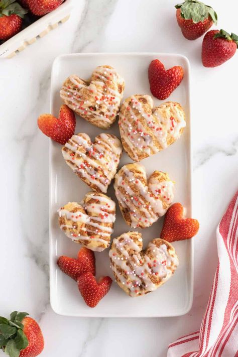 Valentines Traditions, Heart Cinnamon Rolls, Valentines Day Foods, Heart Shaped Baking, Shaped Cinnamon Rolls, The Baker Mama, Heart Shaped Cinnamon Rolls, Baker Mama, Brunch Sandwiches